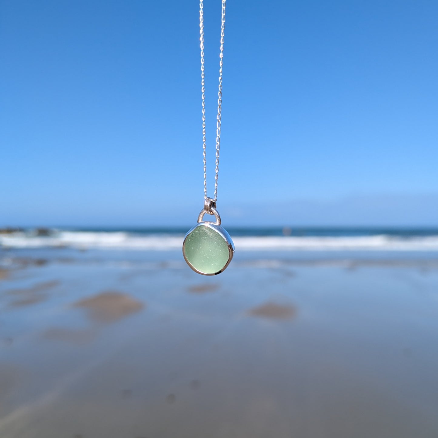 Chunky sea foam sea glass silver pendant looking out to sea