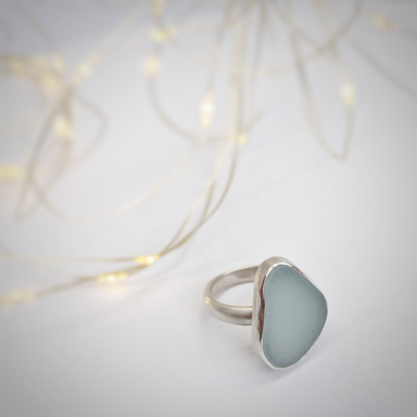 Cornish Sea Mist Matt Silver Ring and fairy lights