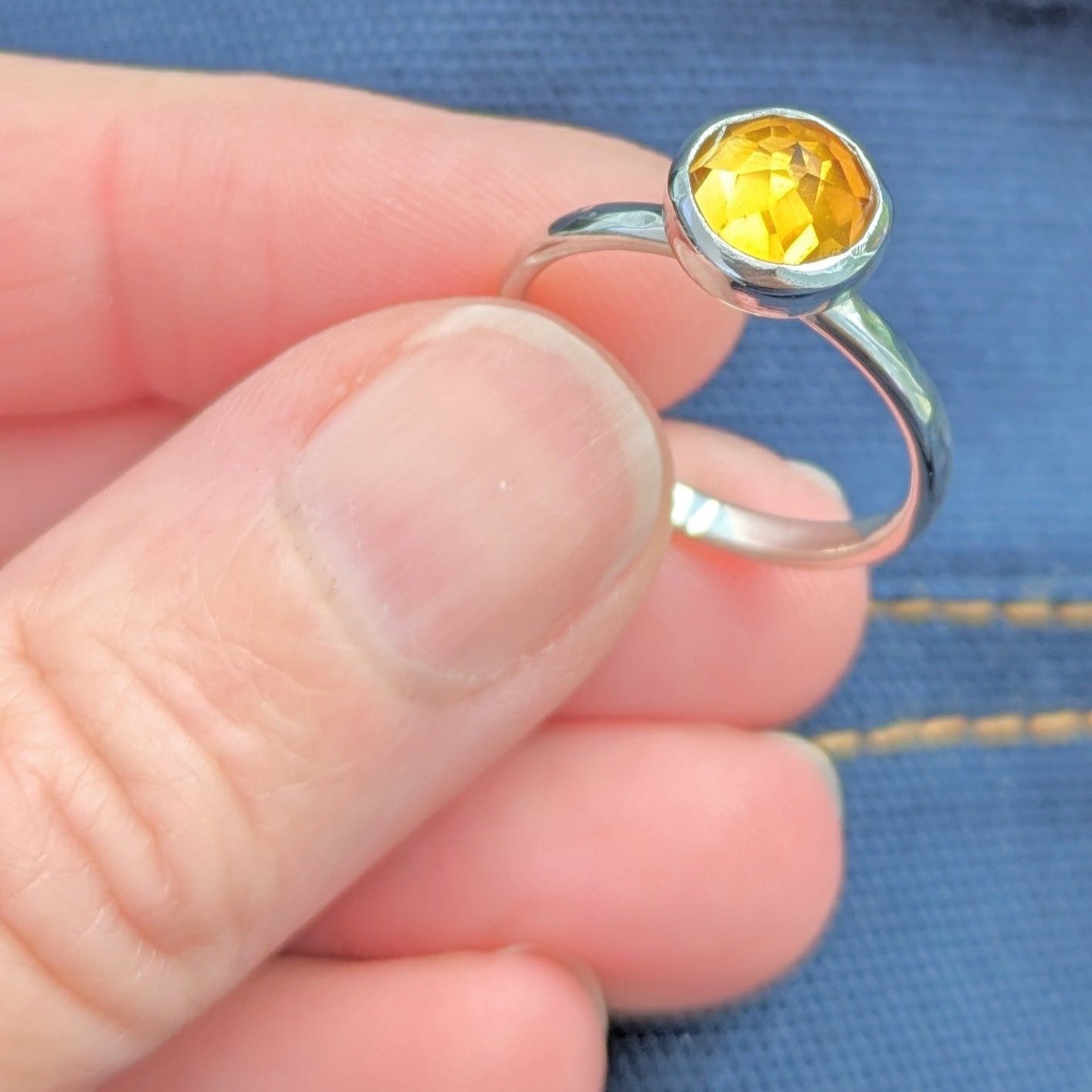 Close up of Citrine gemstone set in silver ring