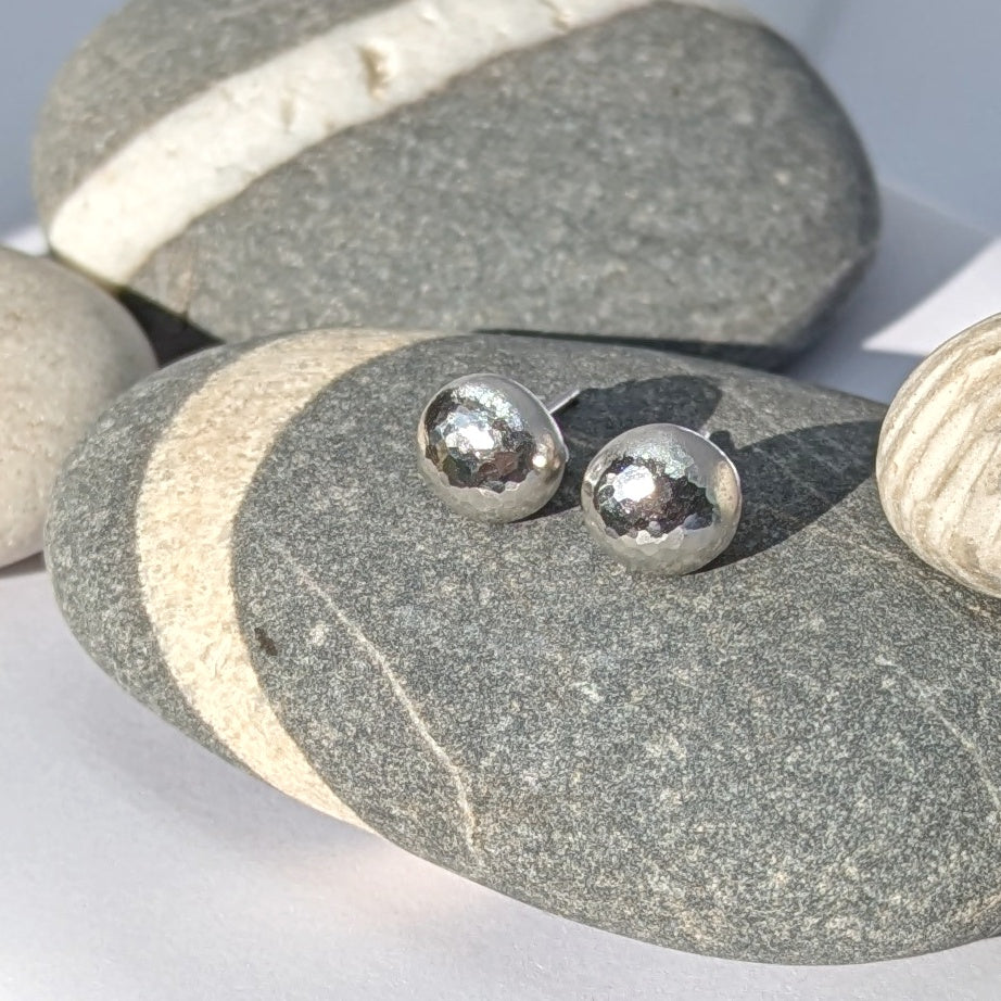 Rock Pool Pebble Earrings on pebbles