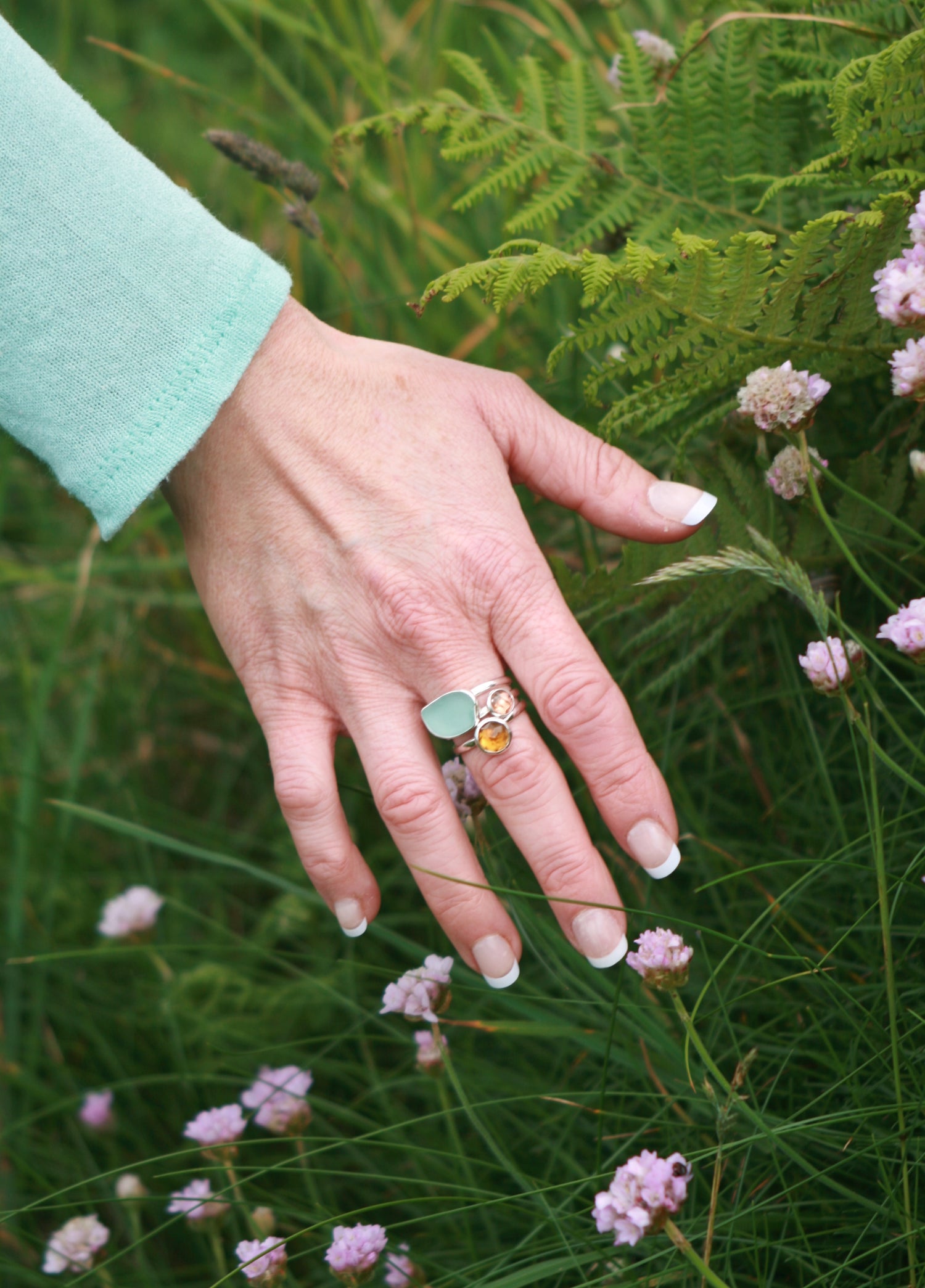 These 3 recycled silver rings feature Blue sea glass, uniquely shaped by the waves, represents the last of the daytime sky. A pinky orange Tourmaline and a sparking rose cut yellow Citrine brings the Cornish sunset to your hand.