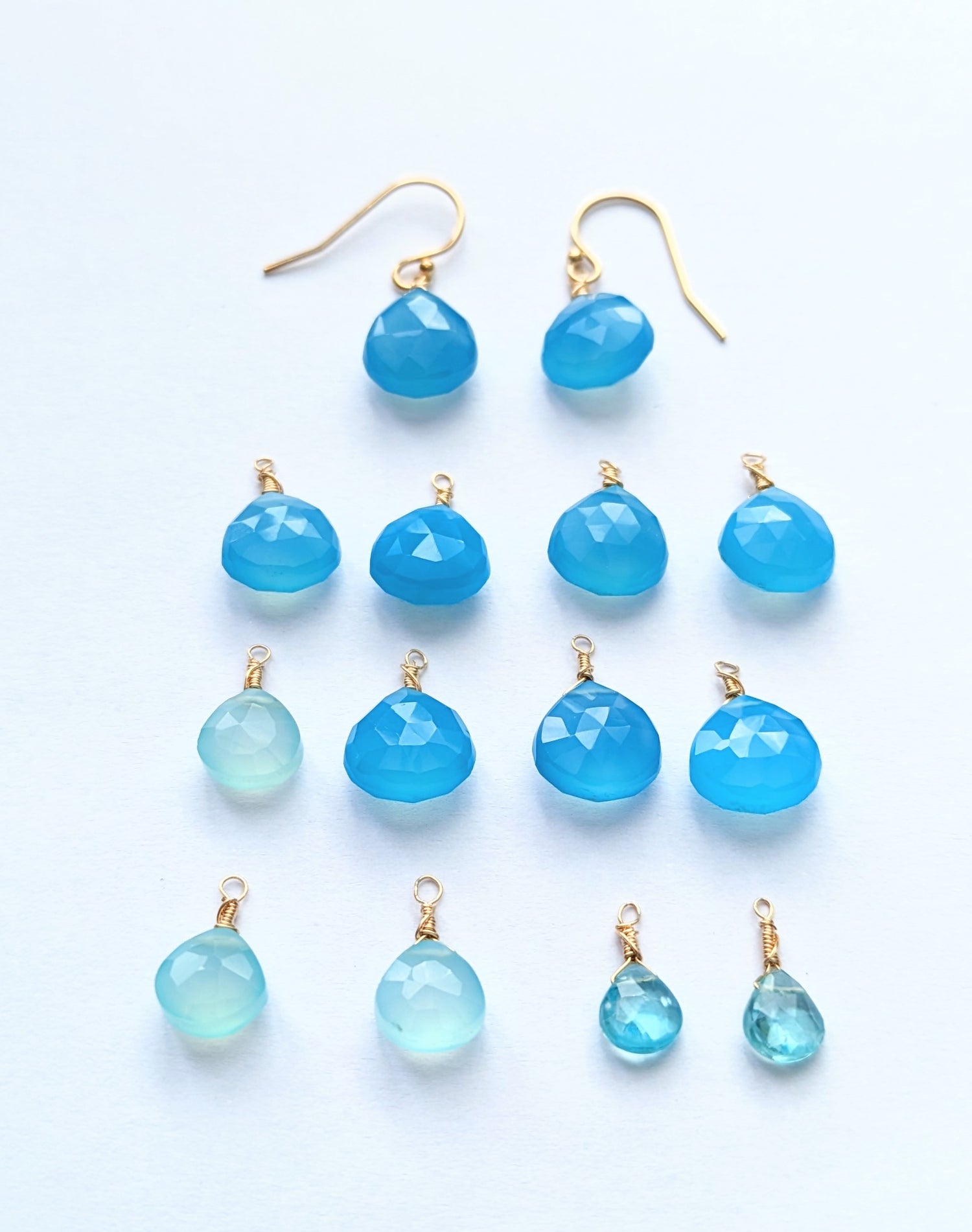 So many beautiful shades make up the colours of the ocean and these gorgeous little earring drops certainly reflect that.  The gemstones hang from gold filled wire.