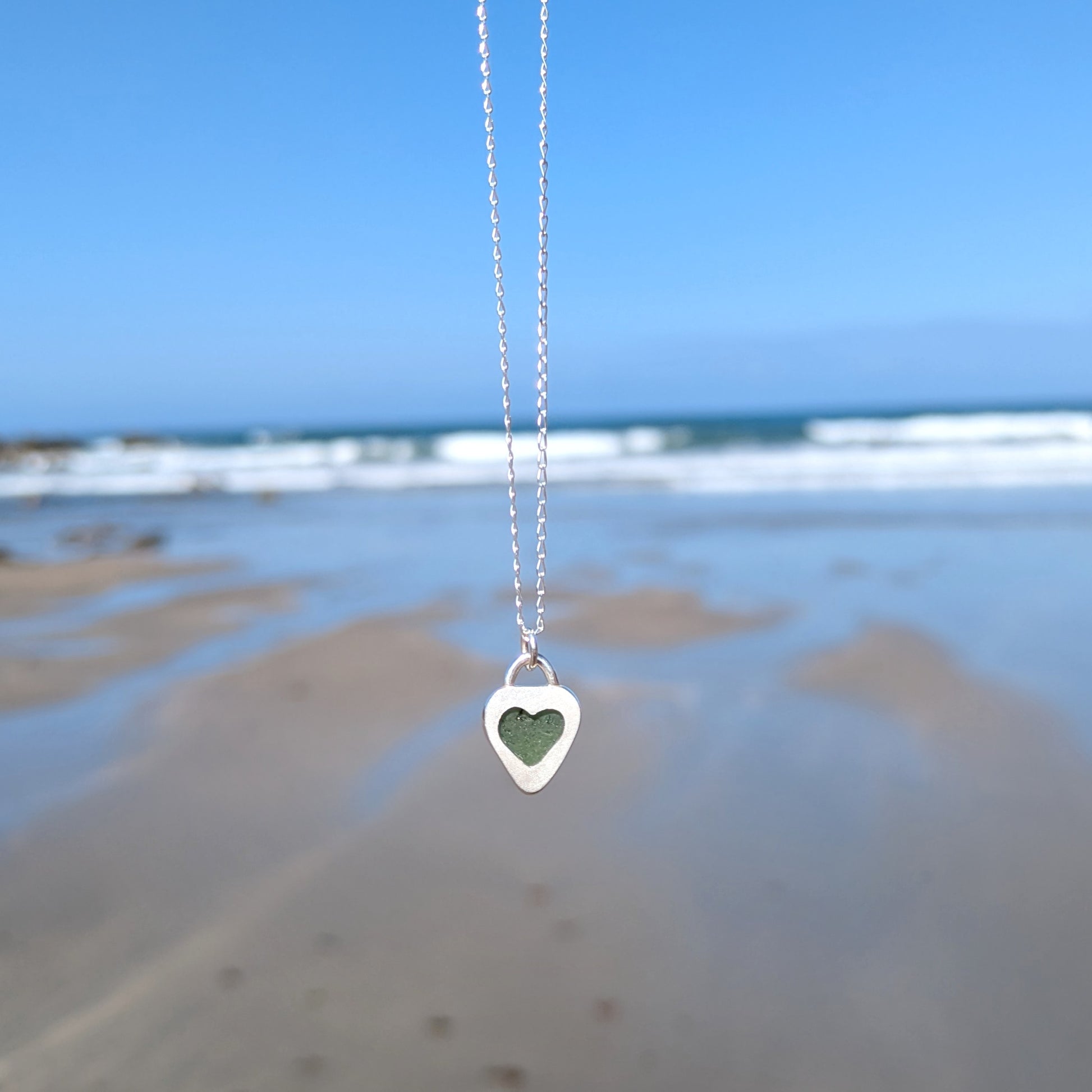 Back of St Ives heart shaped sea glass silver pendant looking out to sea