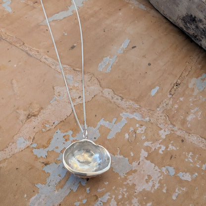 Back of Pure Silver sea shell pendant cast from a real sea shell 