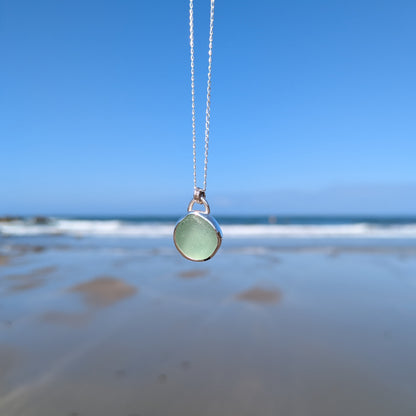Chunky sea foam sea glass silver pendant looking out to sea