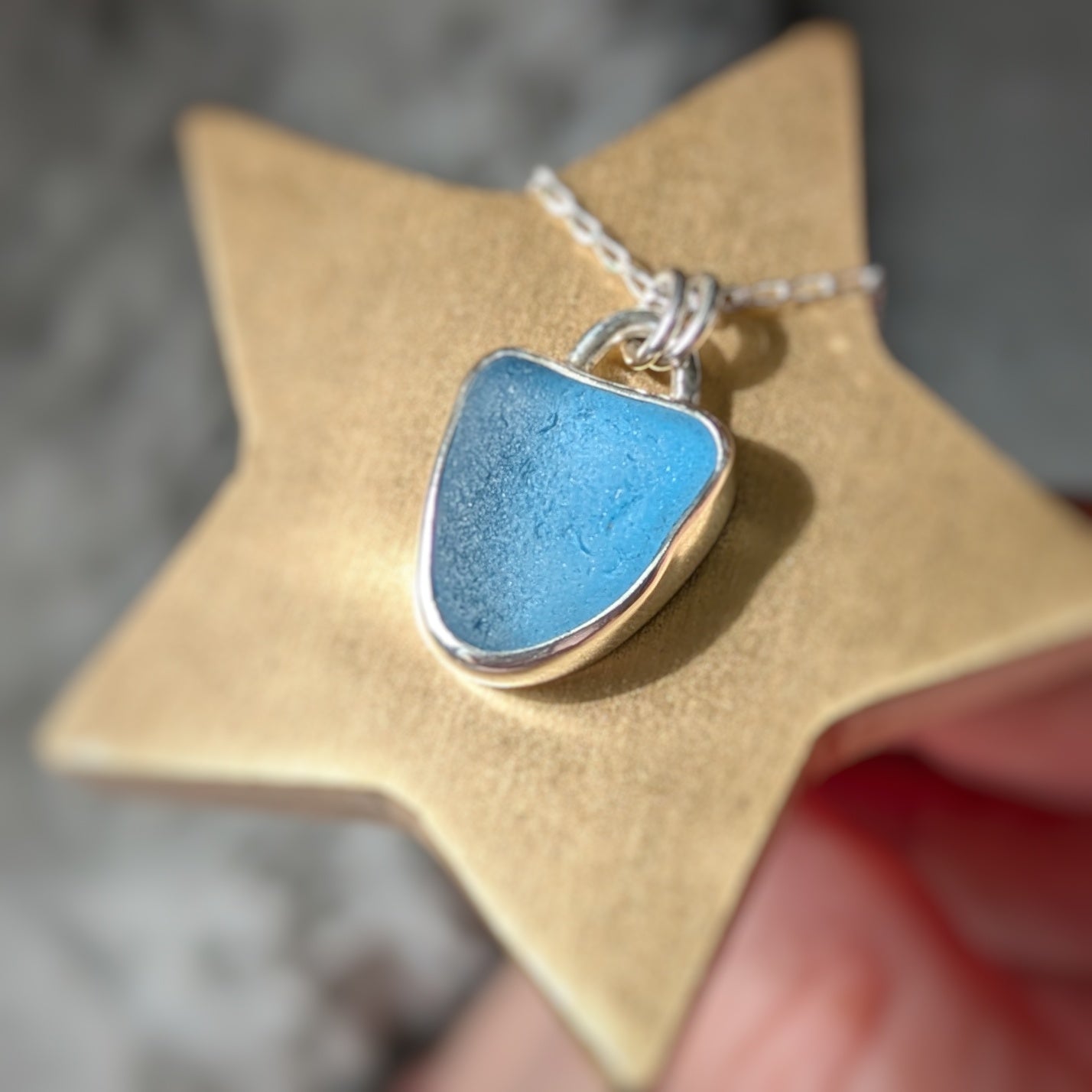 Cornish Blue Sea Glass Silver Pendant on gold star