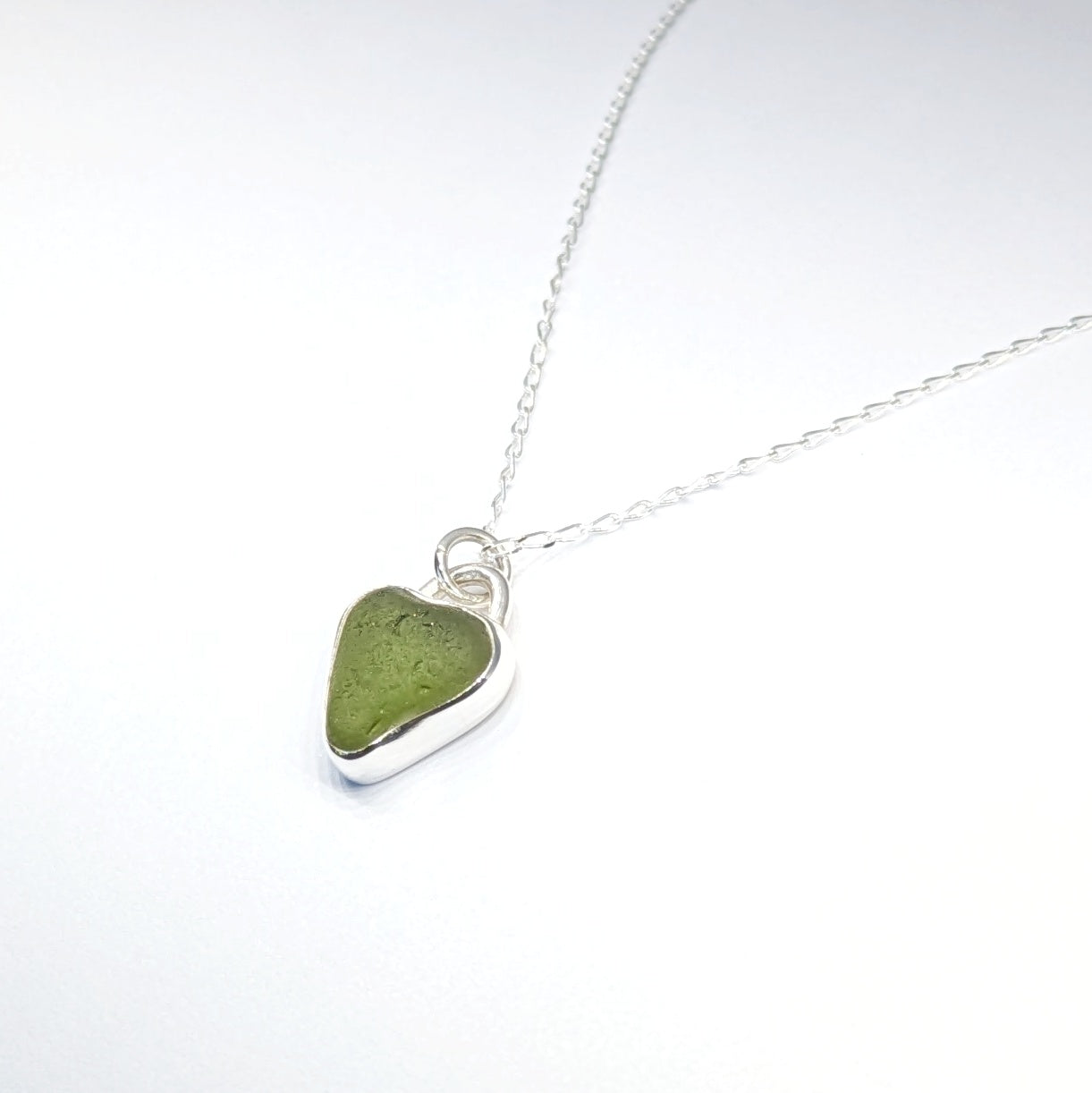 St Ives Green sea glass silver pendant with heart cut out on silver chain