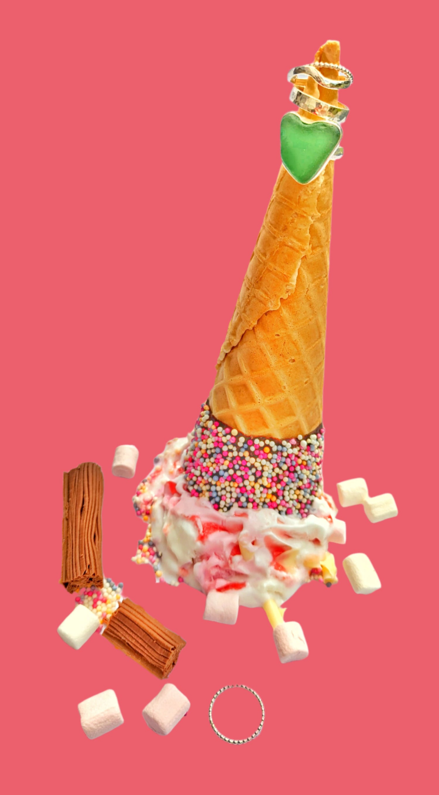 Dropped and landed upside down icecream with rings sitting on the cone