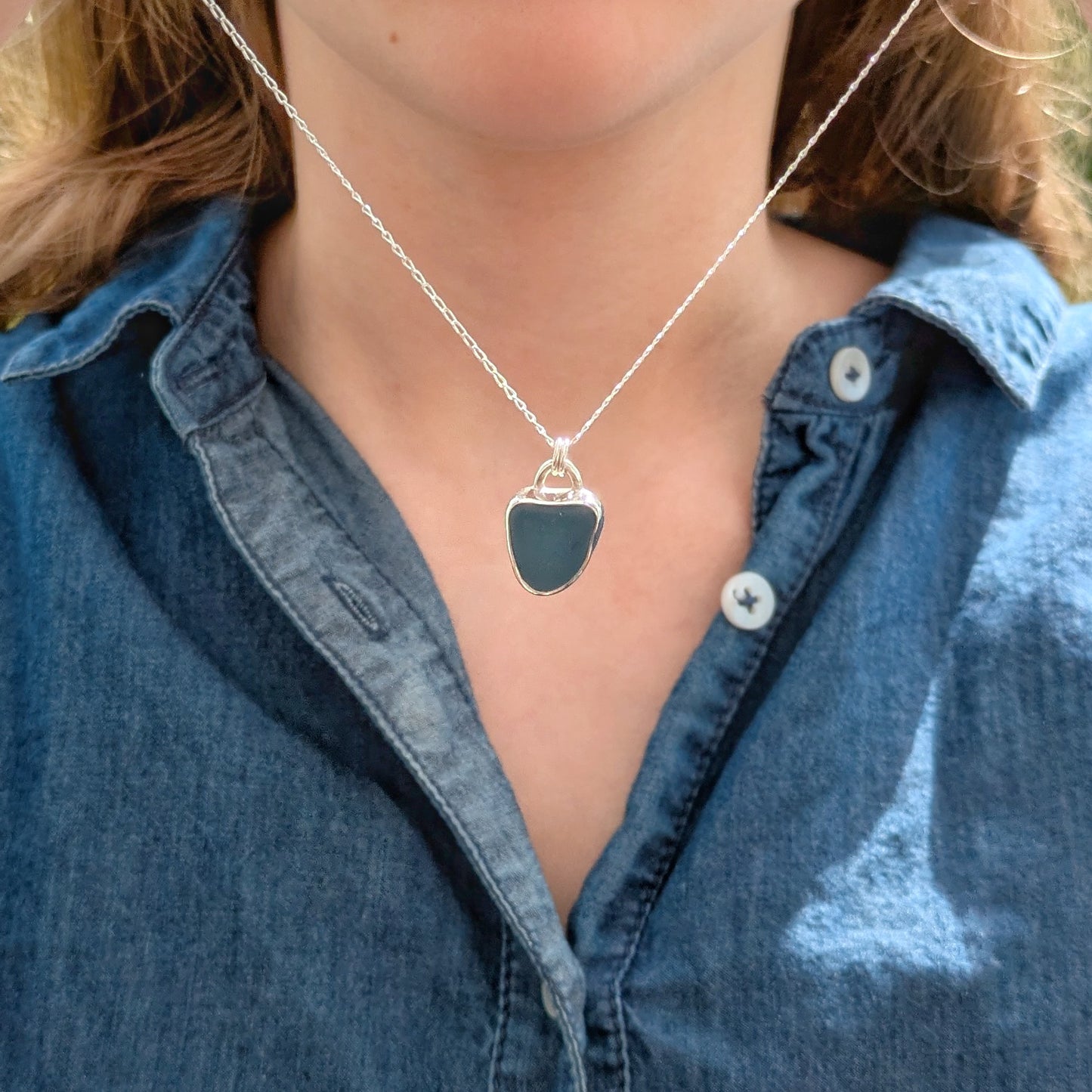 Cornish Blue Sea Glass Silver Pendant on model