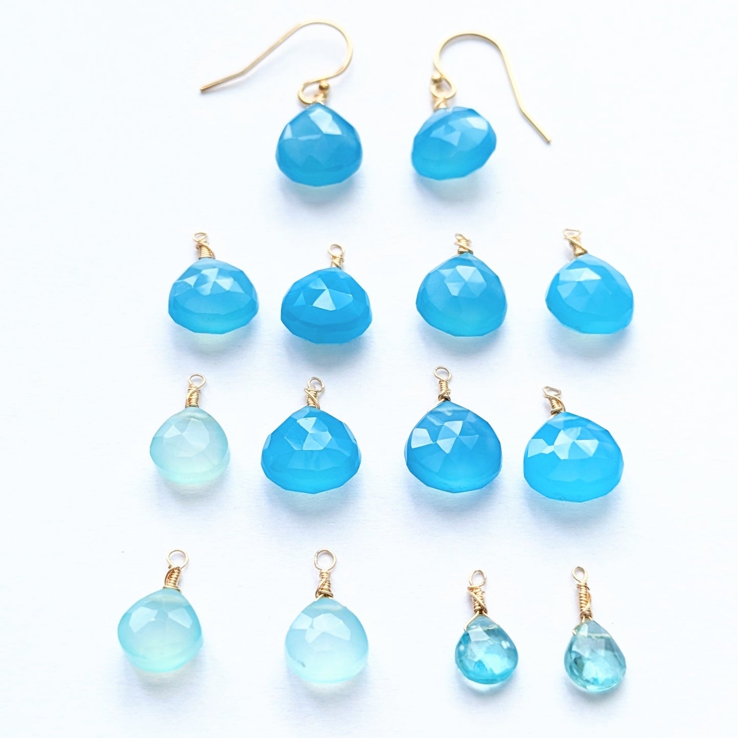 Collection of different blue briolette gemstones for earrings & pendants