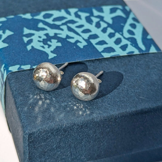 Recycled silver stud earrings. Rock Pool Pebble Earrings on blue gift box