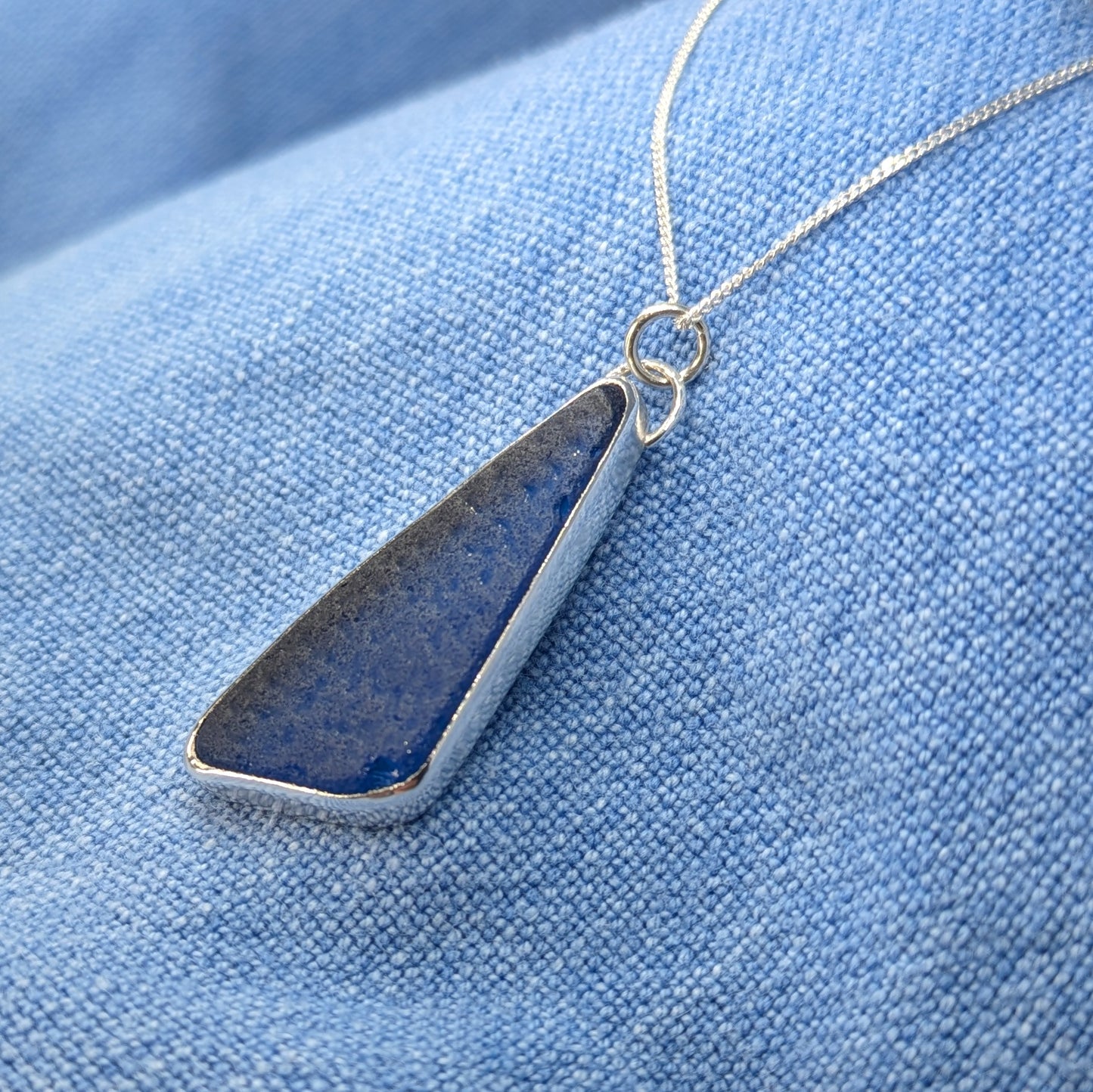 Side view of Midnight Blue Sea Glass Pendant