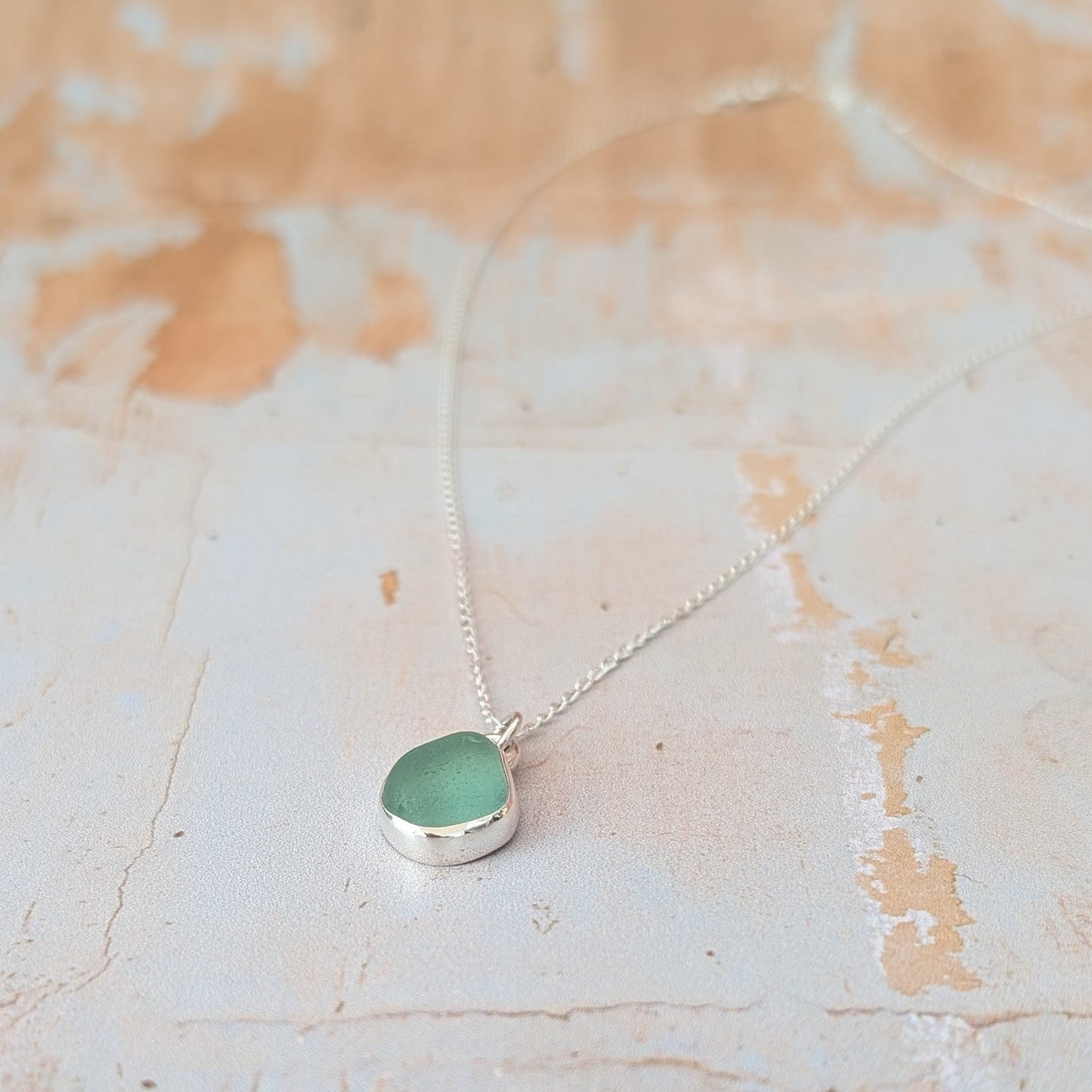 Seafoam Cornish sea glass and silver drop pendant necklace on silver chain