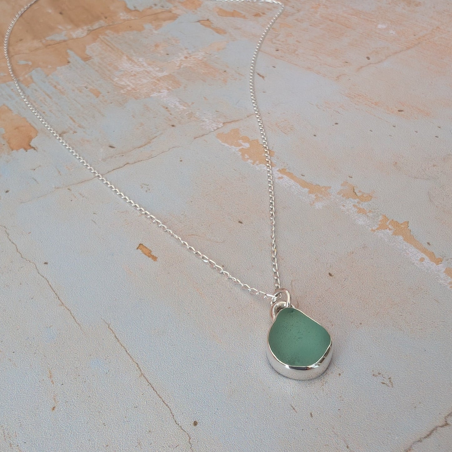 Seafoam Cornish sea glass and silver drop pendant necklace on silver chain