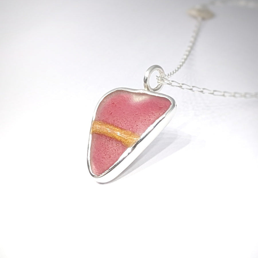 Red Sea Glass Silver Pendant side view on white background
