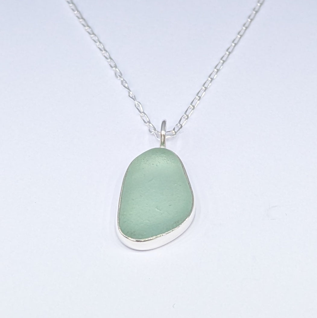 Seafoam sea glass silver pendant on silver chain