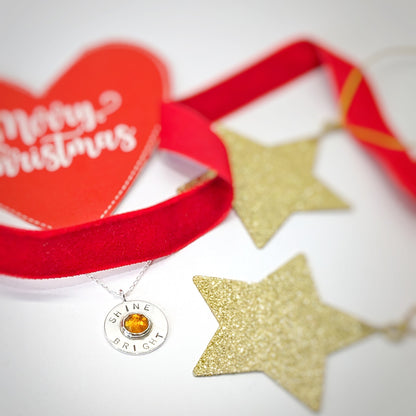 Festive photo of Shine Bright silver and citrine circular pendant