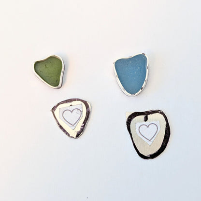 Work in progress heart shaped sea glass silver pendant