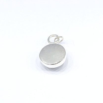 Back of Snowball Moonstone pendant set in sterling silver