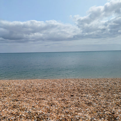 Tiny pebbles beach and sea